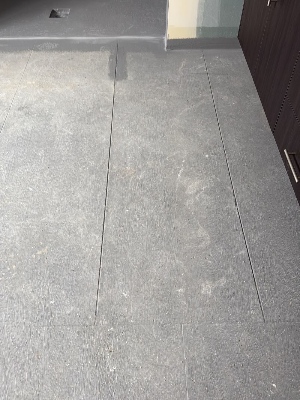 Ensuite floor sheet joints left without bandage ahead of waterproofing, found during a fixing inspection in Pakenham