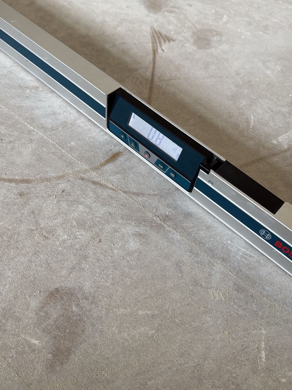 Digital level showing a section of upper floor out of level, found during a fixing inspection in Pakenham