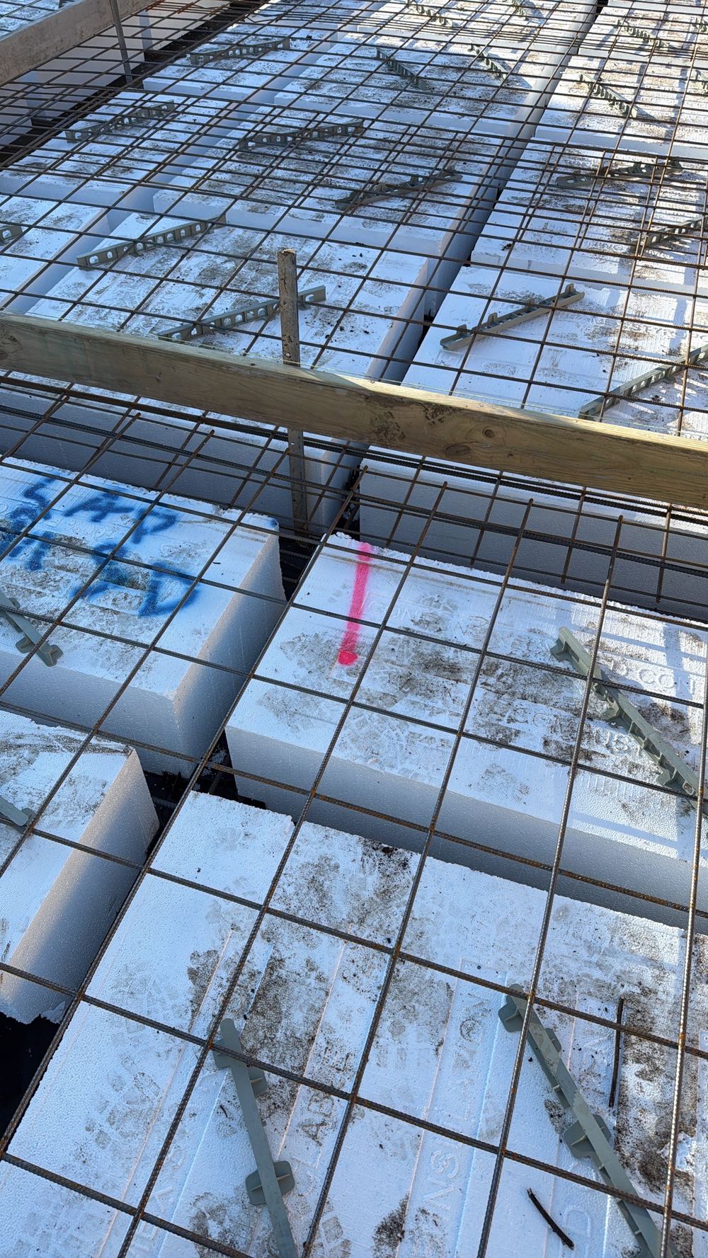 Mesh dipping between pods for want of extra bar supports, found during a slab pre-pour inspection in Cranbourne East