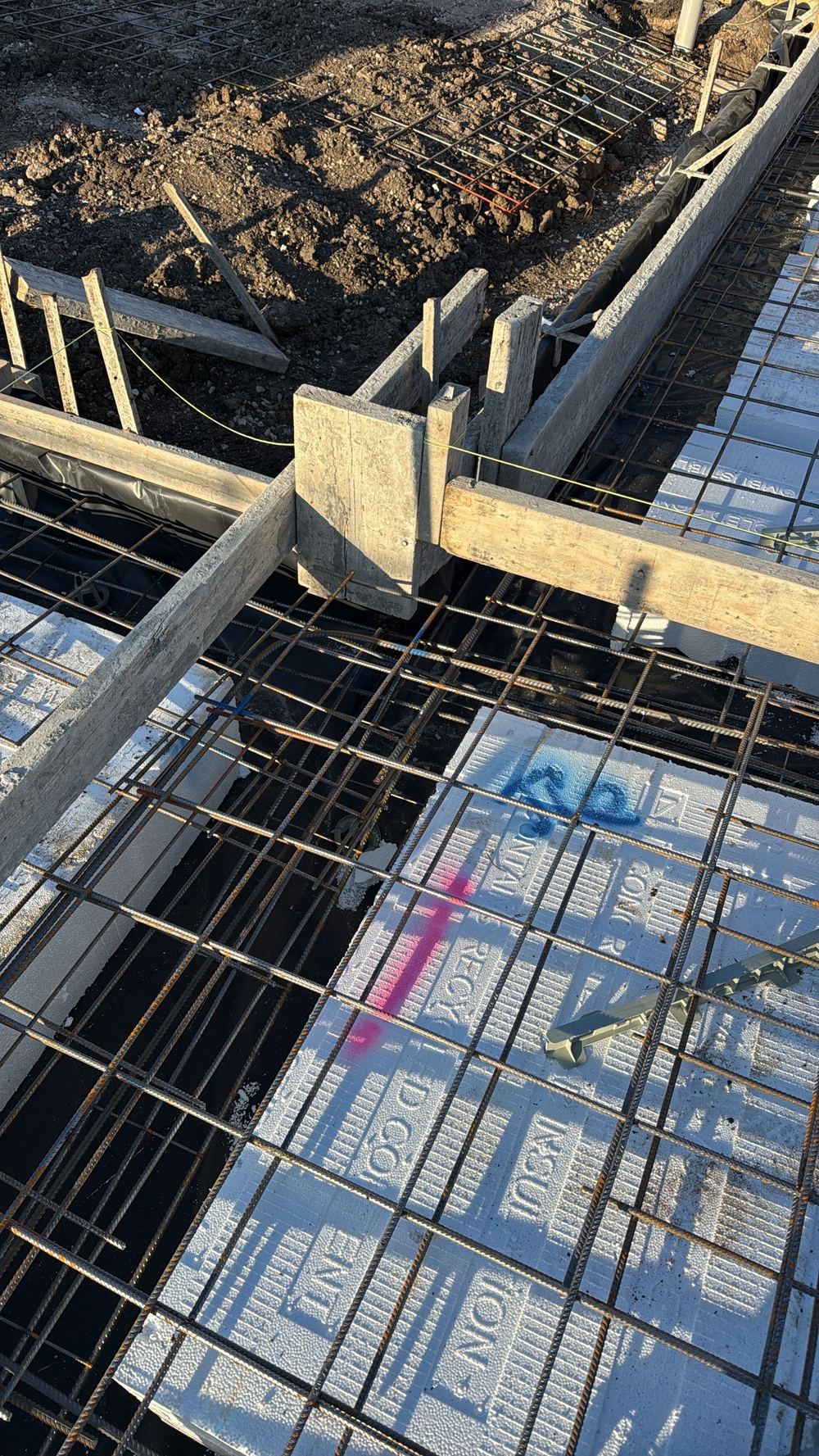 Reinforcement not tied at laps and crossings before the pour, found during a slab pre-pour inspection in Cranbourne East
